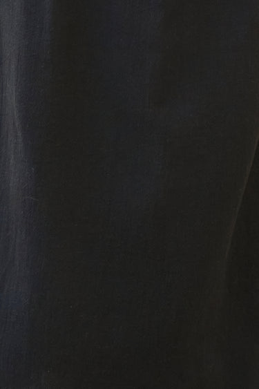 Close-up of jet black osnaburg showing fabric texture.
