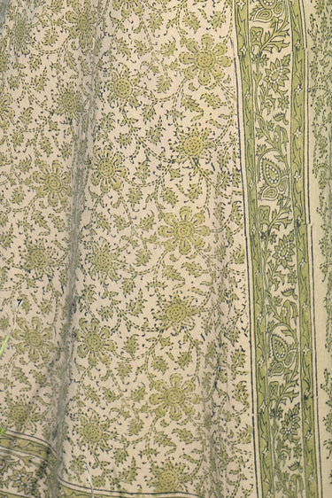 close up of pea calico tapestry fabric.